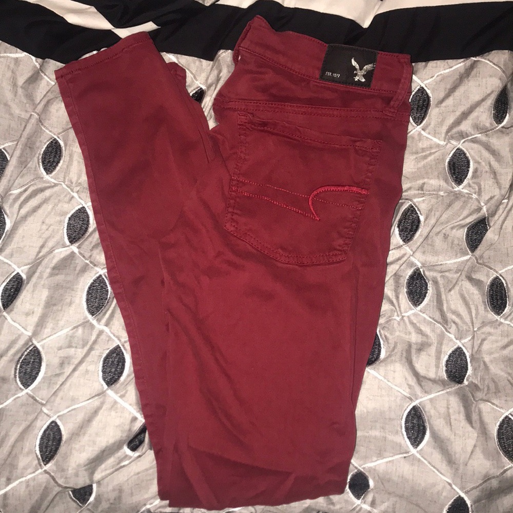 Burgundy American Eagle skinny jeans
